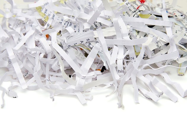 Pile of shredded paper. Recycling difficult waste.